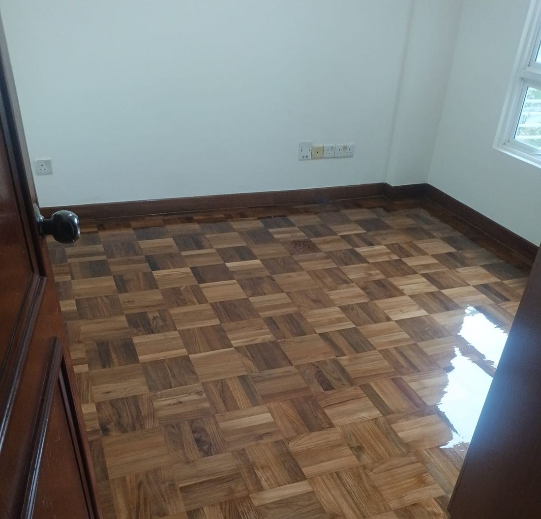 Mosaic finger parquet in an older flat after sanding and varnish